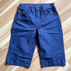 Kids shorts, dark blue, size 7, elastic wristband and zipper and button.